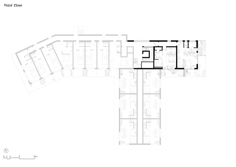 Third floor plan showing simplified residential layout with central vertical circulation core