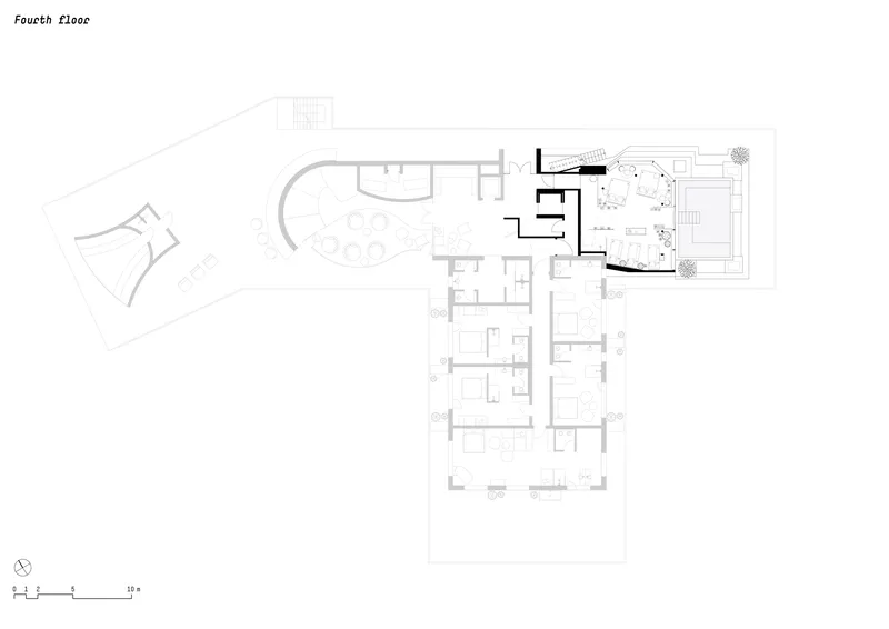 Fourth floor plan featuring rooftop terrace with trees and open gathering spaces