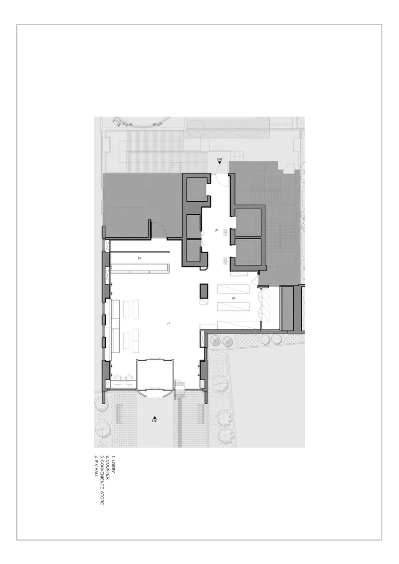 Floor plan drawing showing an open lobby space with service cores and outdoor terrace