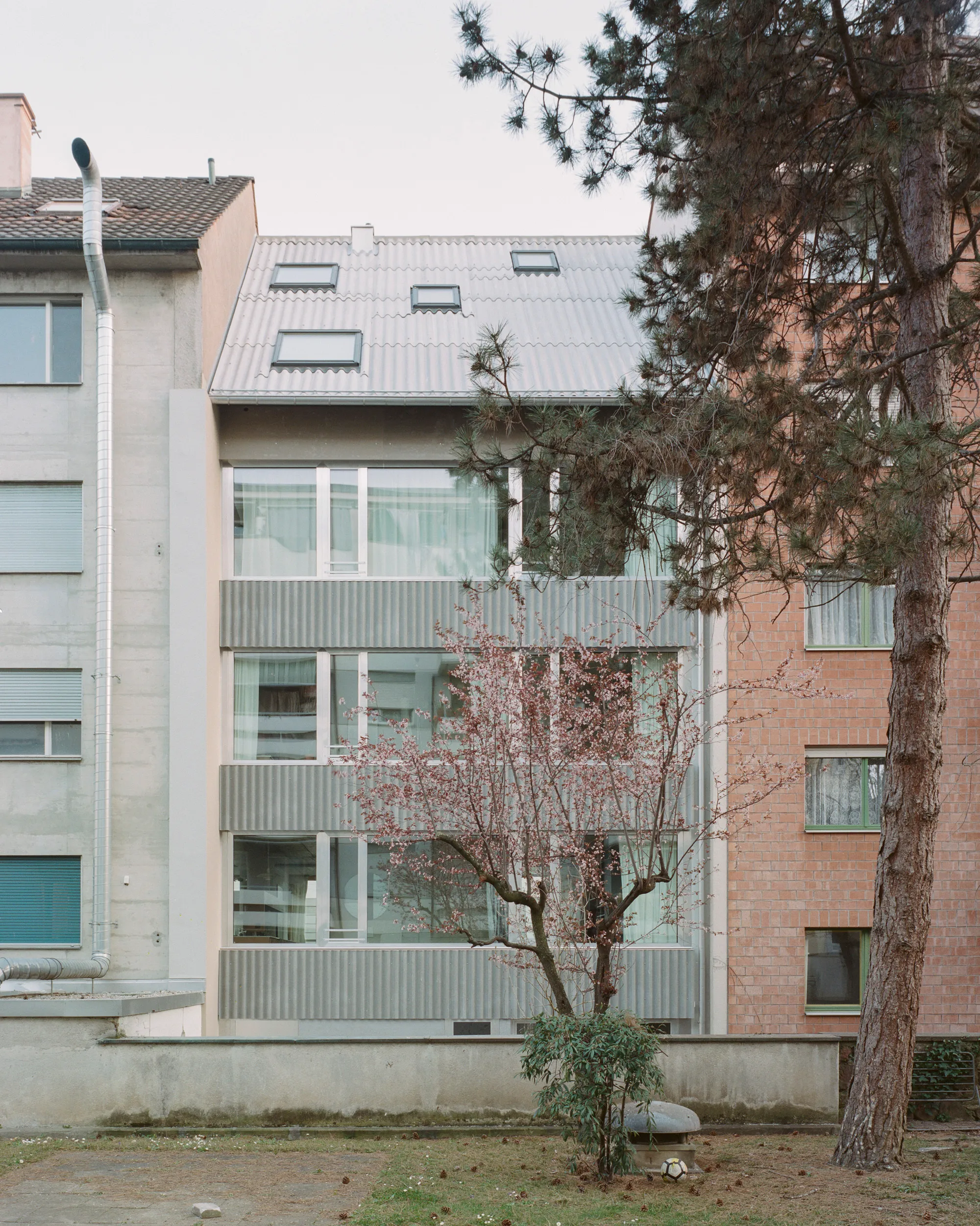 Wallimann Reichen Packs a Loft House in Miniature into a Tight Basel Plot