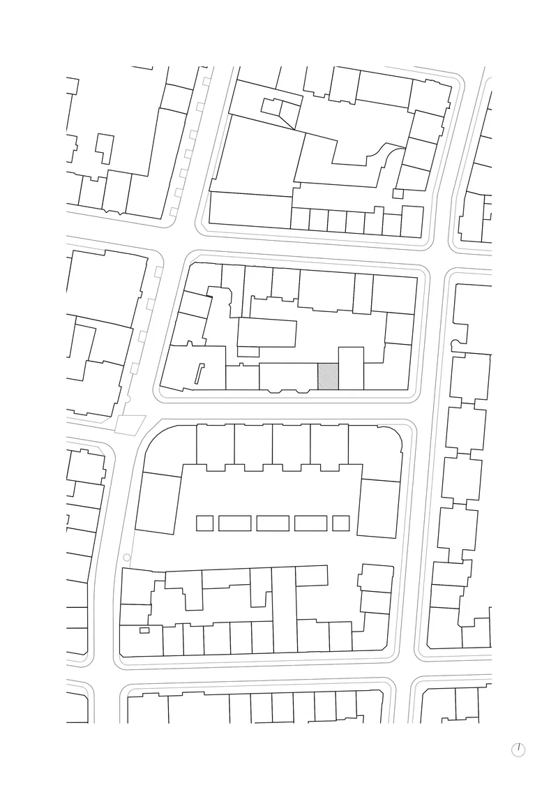 Site plan drawing showing building footprints and streets in an urban block layout
