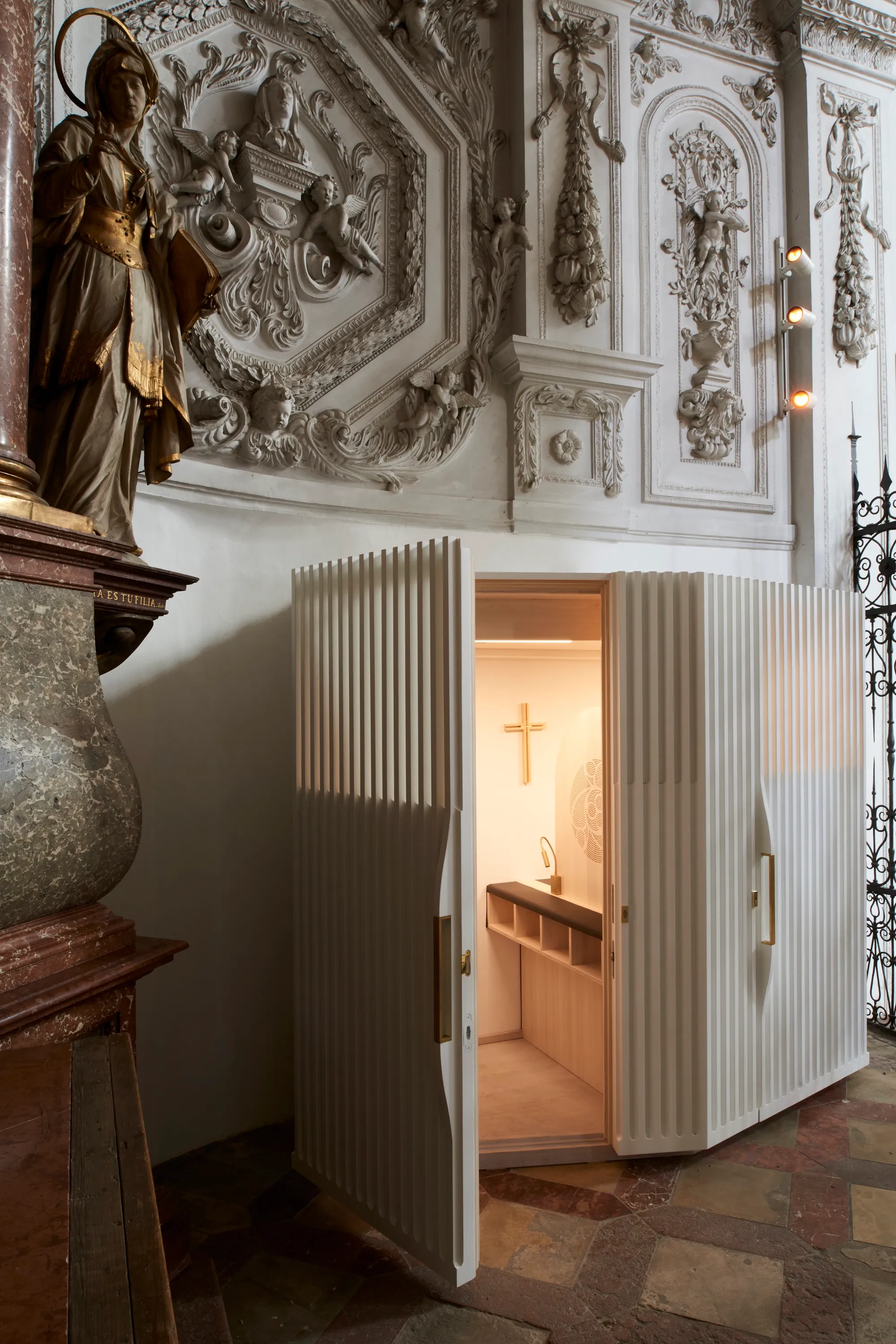 Kunze Seeholzer Architekten Slip Six Luminous Confessionals into a Renaissance Church in Munich