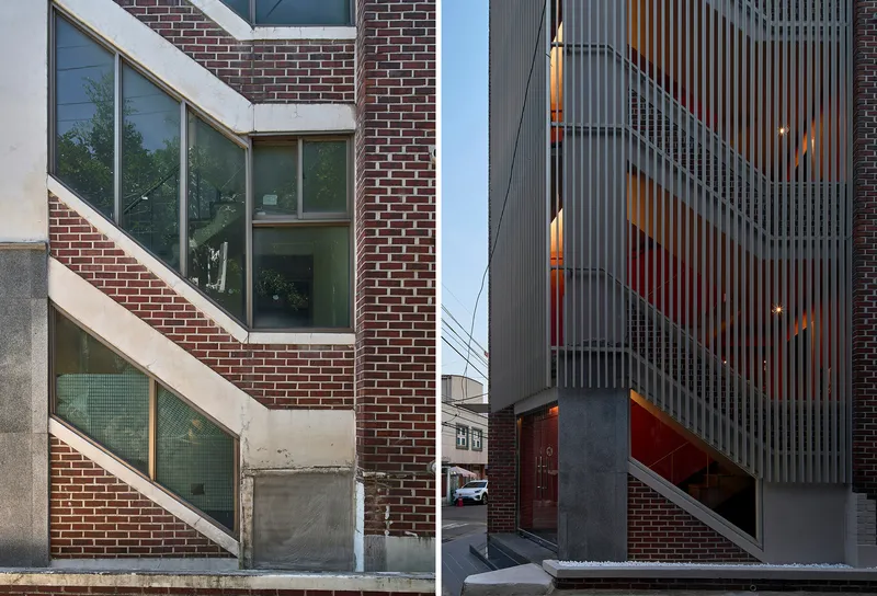 Street view comparing the original brick facade with the renovated addition clad in vertical metal fins