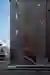 skimA Slots a Vertical Metal Tower into a Yeonnam-dong Brick House to Make It Mixed Use