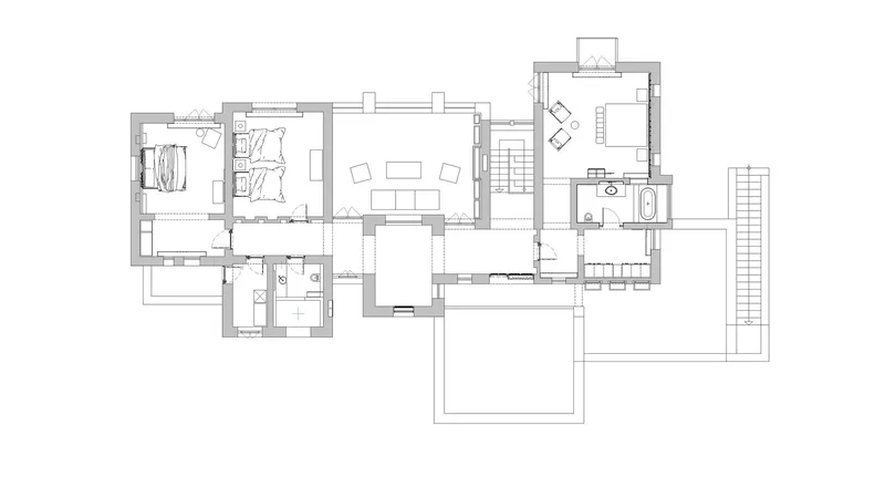 Floor plan drawing showing a residential layout with bedrooms, living areas, bathroom and exterior deck
