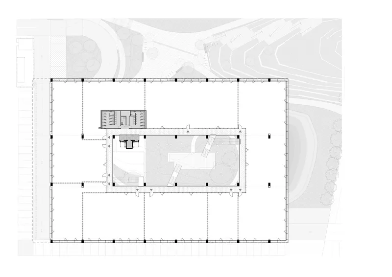 Ground floor plan showing a rectangular perimeter with a central core and surrounding landscape contours