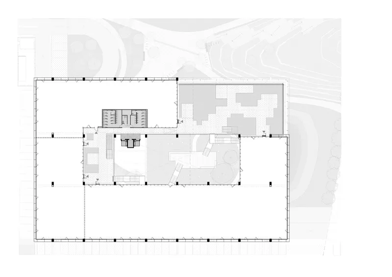 Second floor plan showing expanded program zones with textured areas indicating outdoor terraces