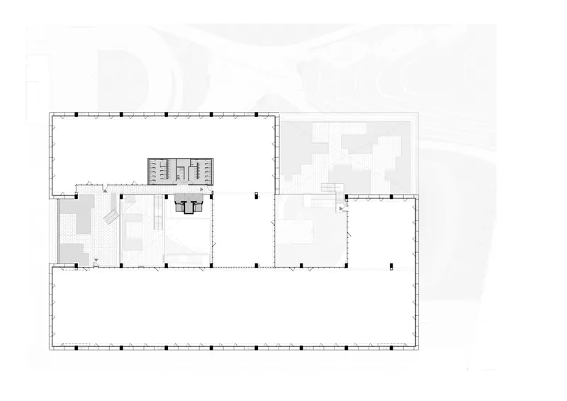 Third floor plan showing reduced footprint with central core and outdoor terraces on multiple sides