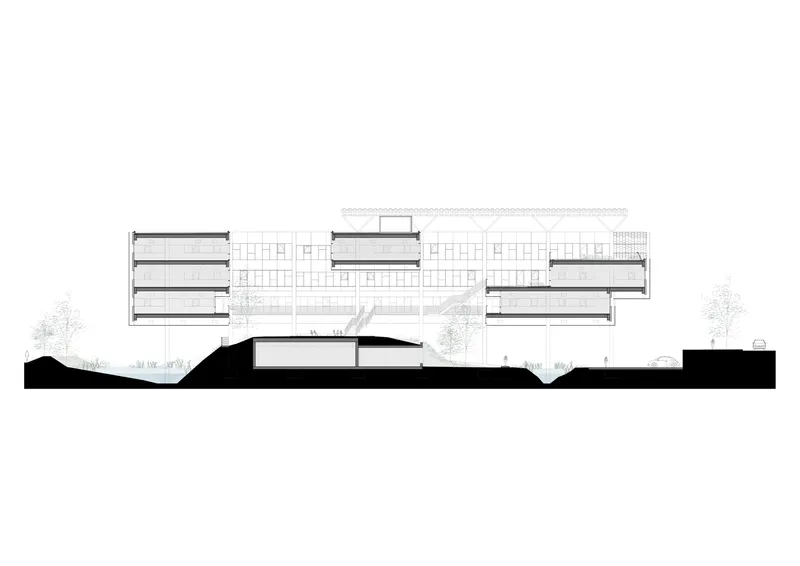 Section drawing through the building showing stacked floors above a sunken below-grade space with trees