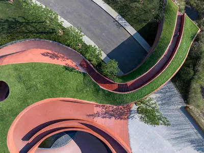 Change Architects Sculpt a Terracotta Shell into the Hillside at Chaohu Natural and Cultural Center