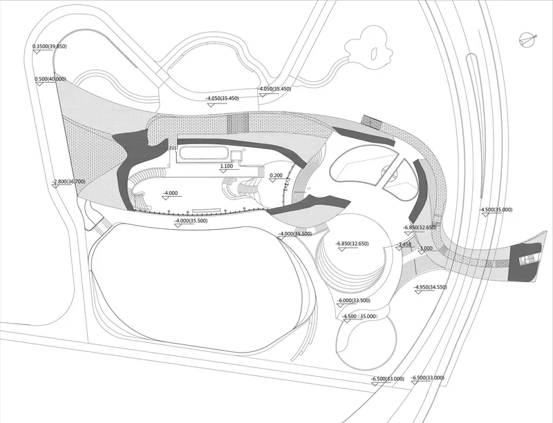 Site plan drawing showing three lobed volumes with curved roofs and topographic contours
