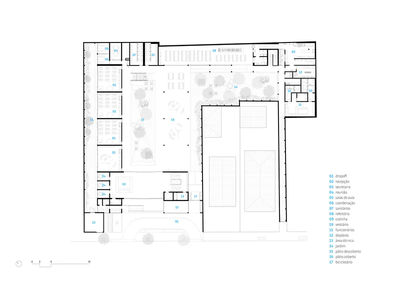 Ground floor plan drawing showing classrooms along the perimeter and two sports courts in the central volume
