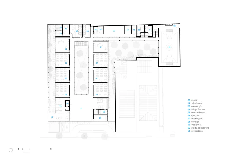 First floor plan drawing showing classrooms, circulation zones, and open space above the gymnasium courts
