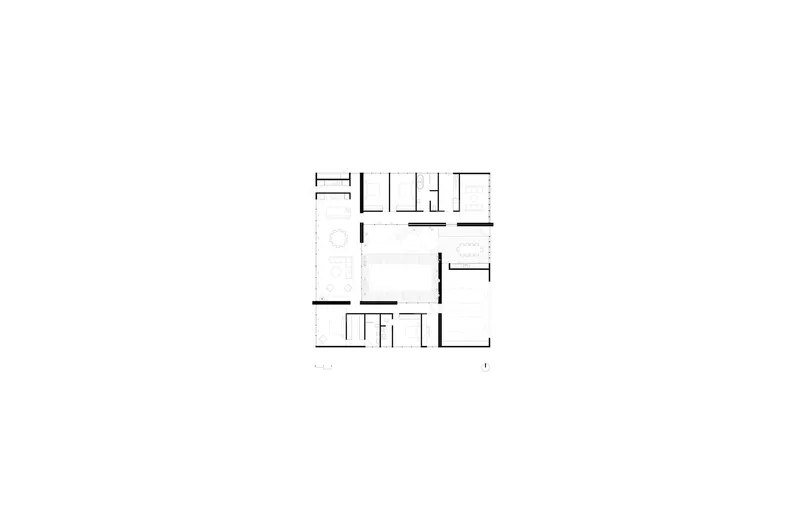 Floor plan drawing showing a square layout with rooms arranged around a central courtyard