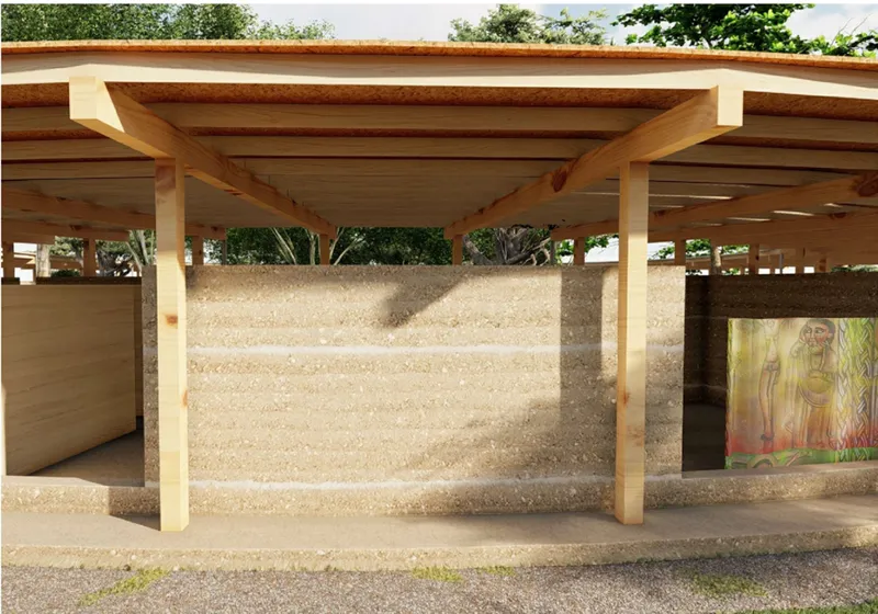 Rammed earth walls and timber structure showcase sustainable architecture through local materials.