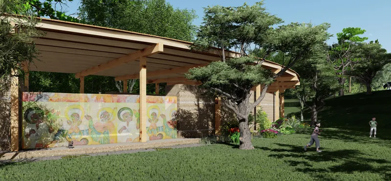 Chapel façade blending natural materials, cultural artwork, and landscape integration.