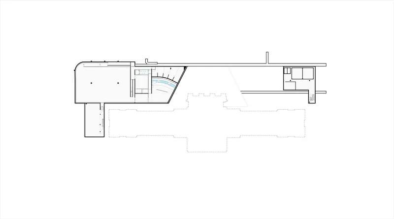 Floor plan drawing showing an angled entrance with curved stair adjacent to a large open volume