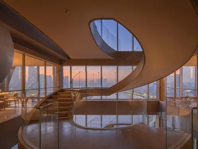 V2GETHER Design Threads a Spiraling Restaurant Through a 1990s Shanghai Tower