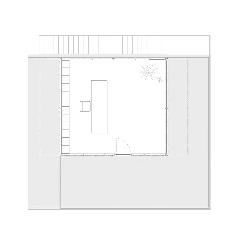 Floor plan drawing depicting a rectangular interior with a central table and flanking terraces