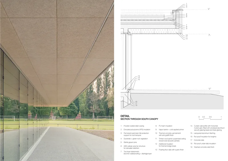 Covered walkway with timber soffit panels and glazed walls looking out to a green playing field