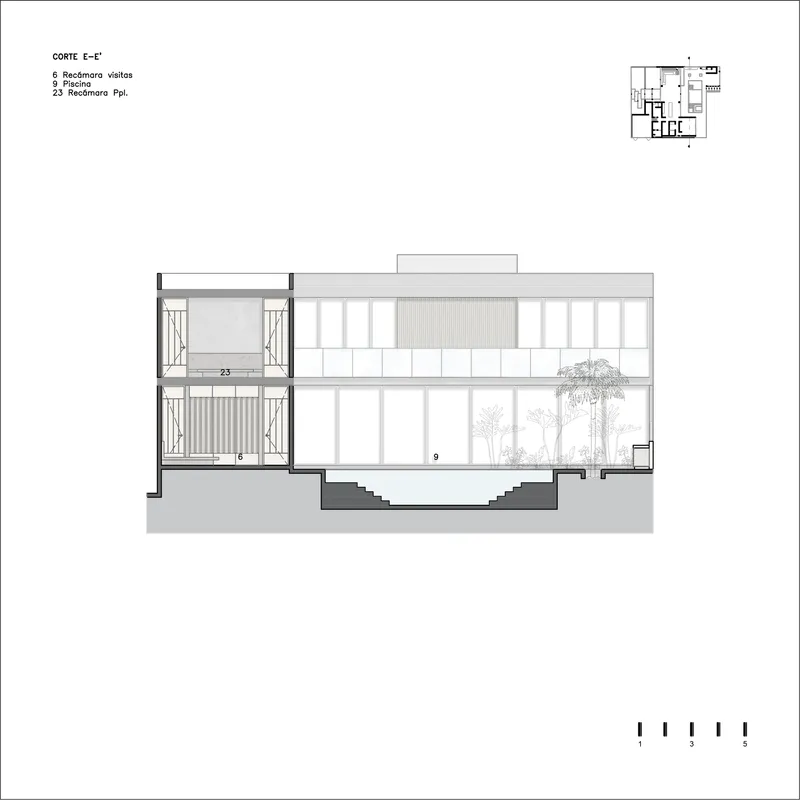 Section drawing displaying double-height courtyard with trees and flanking stacked balcony spaces
