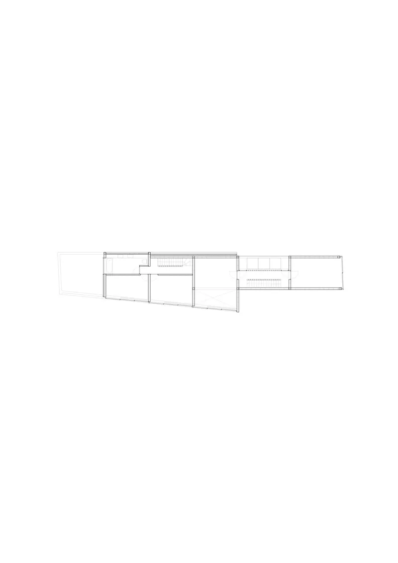 Floor plan drawing showing interior spaces with partitions and exterior deck areas