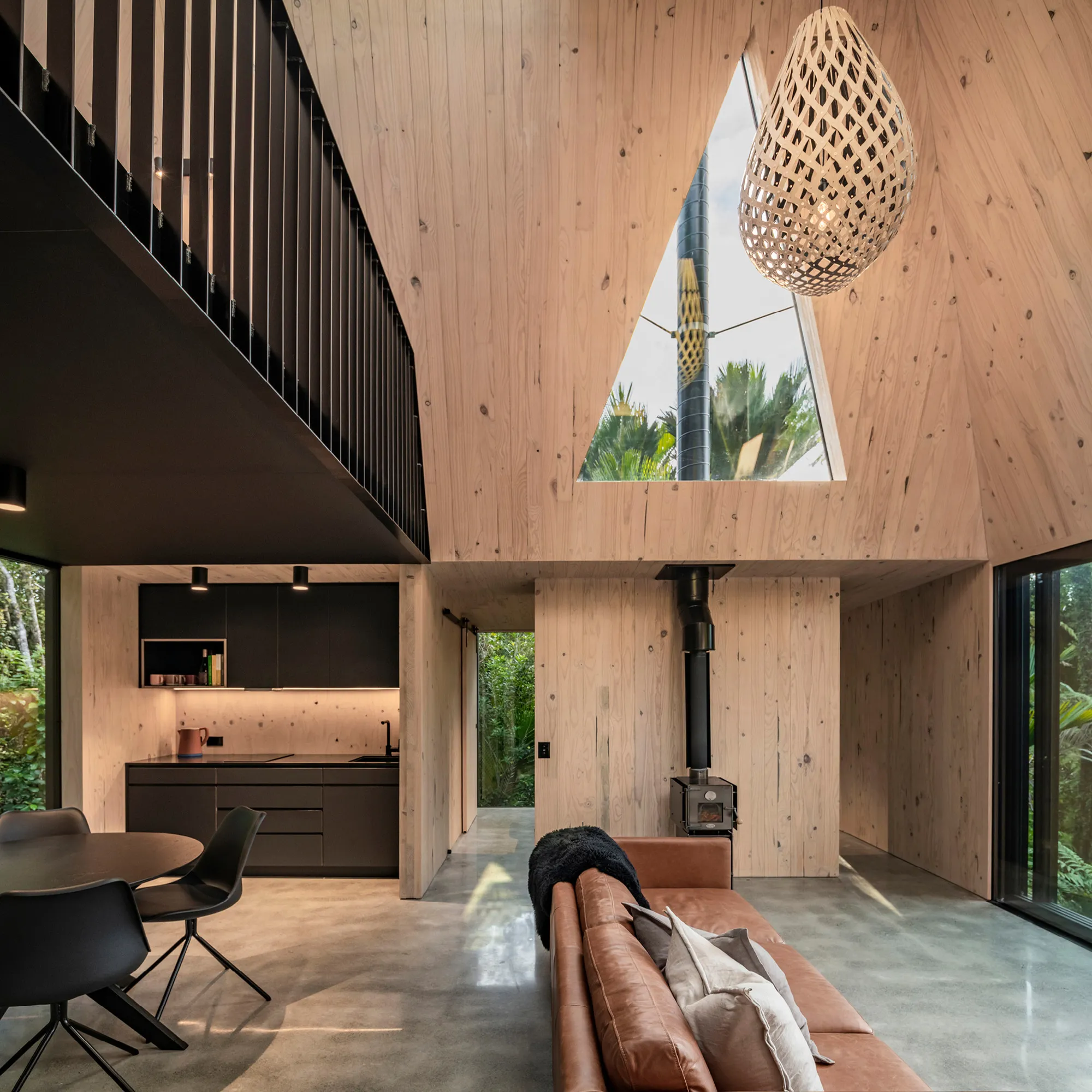 Fabric Reimagines the Gold Miner's Hut as a 46 m² Retreat in New Zealand's Subtropical Bush