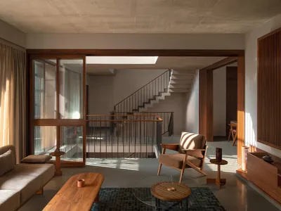 ROOMOOR Carves a Central Void Through a Dense Surat Townhouse to Let It Breathe