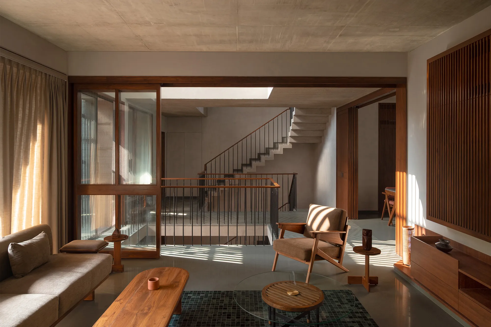 ROOMOOR Carves a Central Void Through a Dense Surat Townhouse to Let It Breathe