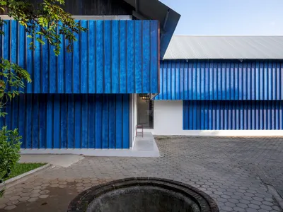 Sher Maker Stitches a Textile Workshop from Corrugated Steel and Dyed Timber in Chiang Mai