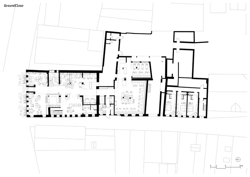 Ground floor plan drawing showing restaurant and commercial spaces with irregular property boundaries
