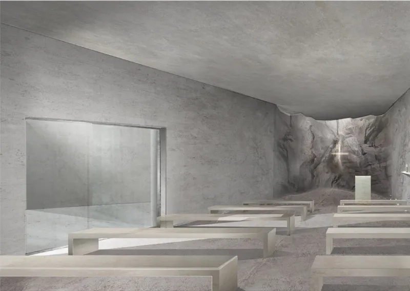 The underground prayer hall leads worshippers toward a carved stone altar.