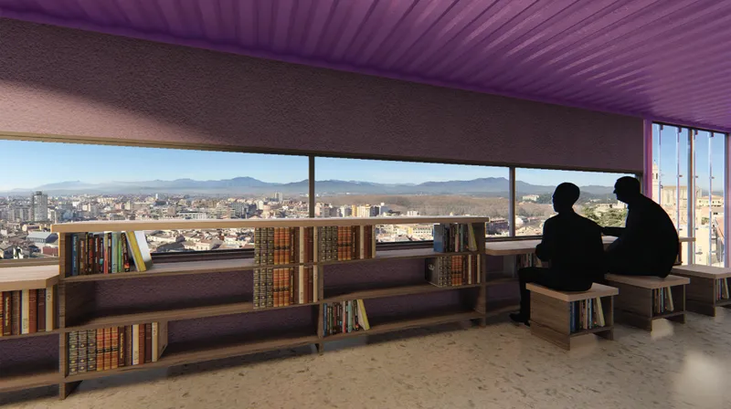 Panoramic reading area overlooking the cityscape of Girona.