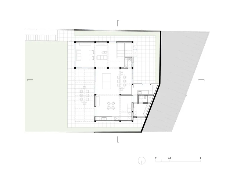 Floor plan drawing showing open living and dining spaces with a screened terrace and service rooms