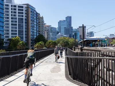 Collins and Turner and ASPECT Studios Unspool a Bronze-Railed Cycleway off the Sydney Harbour Bridge
