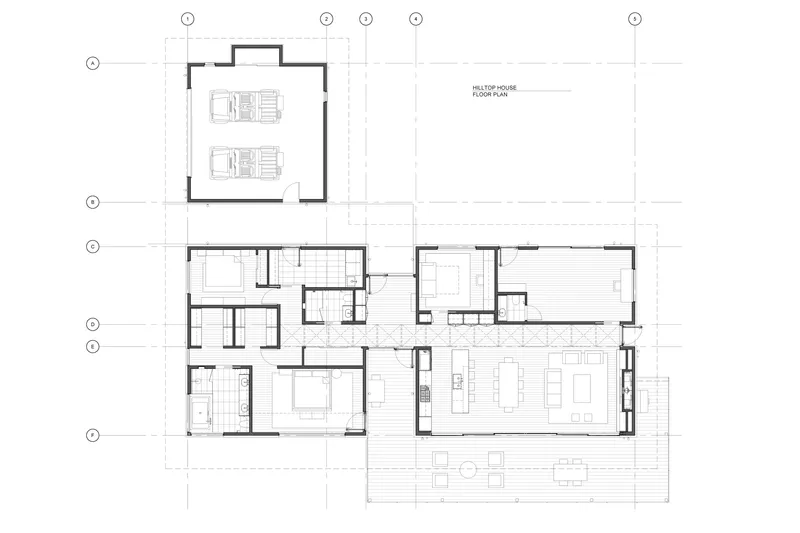 Floor plan drawing showing a residential layout with a detached garage and hillside deck