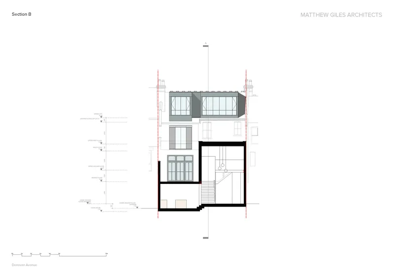 Section drawing showing glazed dormer addition above existing facade and stairwell
