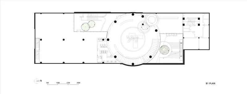 Basement plan showing circular gathering space with central element and surrounding column grid