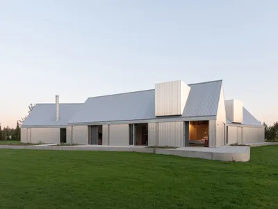 Ultra Architects Disguises a Polish Lakeside Home as a Cluster of Boathouses