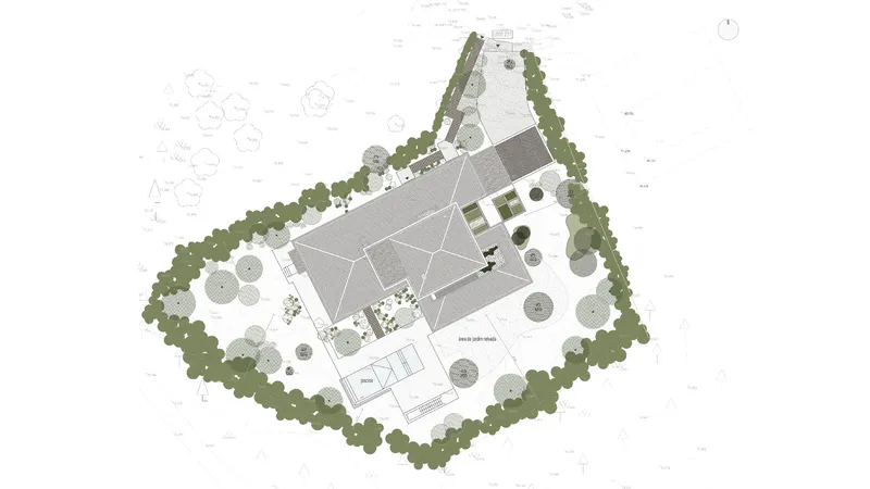 Site plan drawing showing the residence surrounded by a dense tree buffer