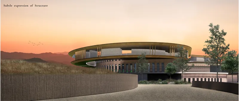 The winery’s curved profile settles into the Cape Winelands beneath the warm evening sky.