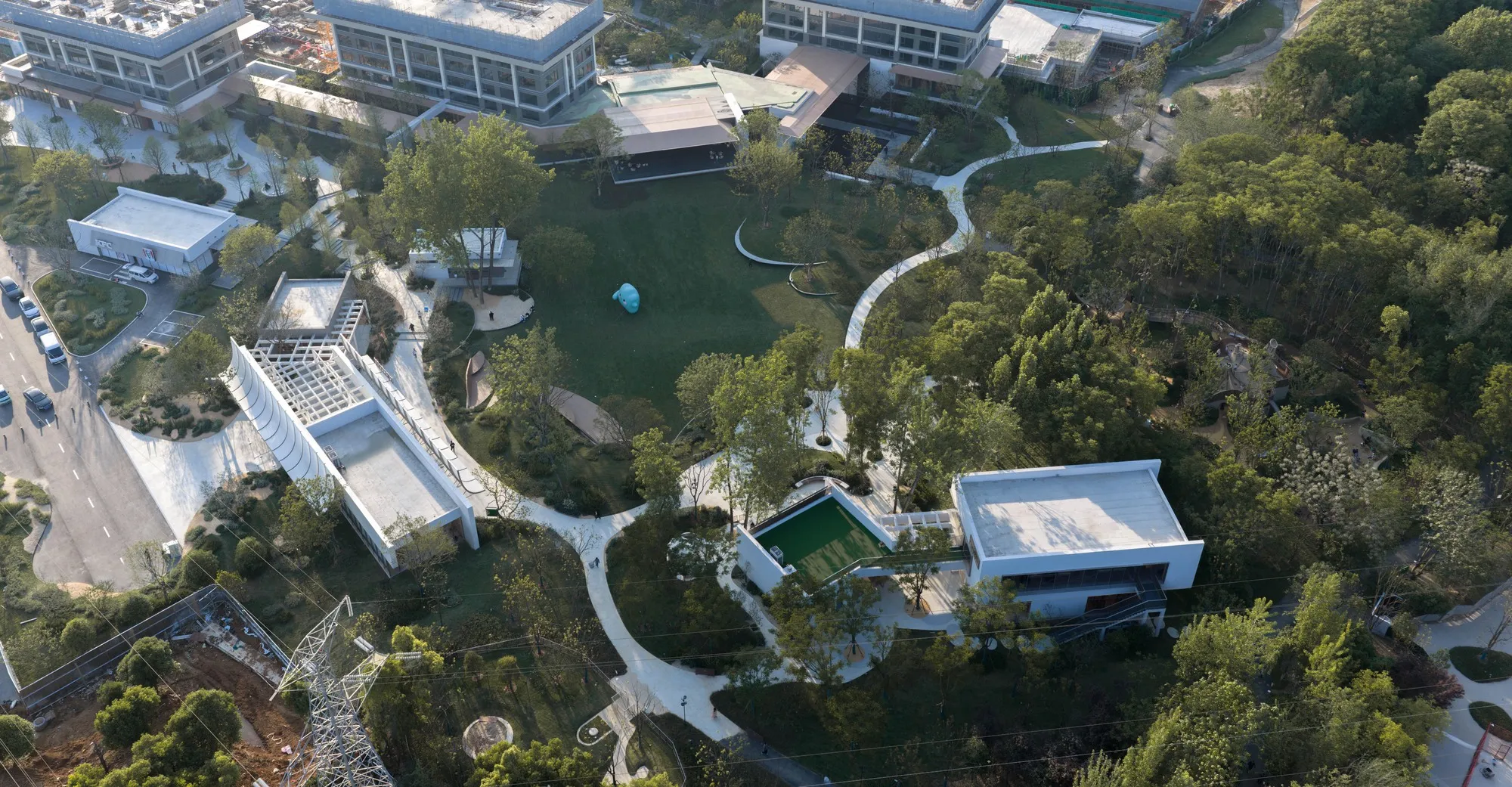 Dachuan and WTD Weitu Scatter Pavilions Across a Wuhan Hillside to Revive a Commercial Park