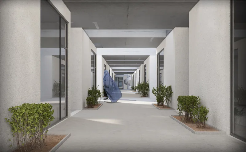 A shaded internal walkway supports movement and everyday social interaction.