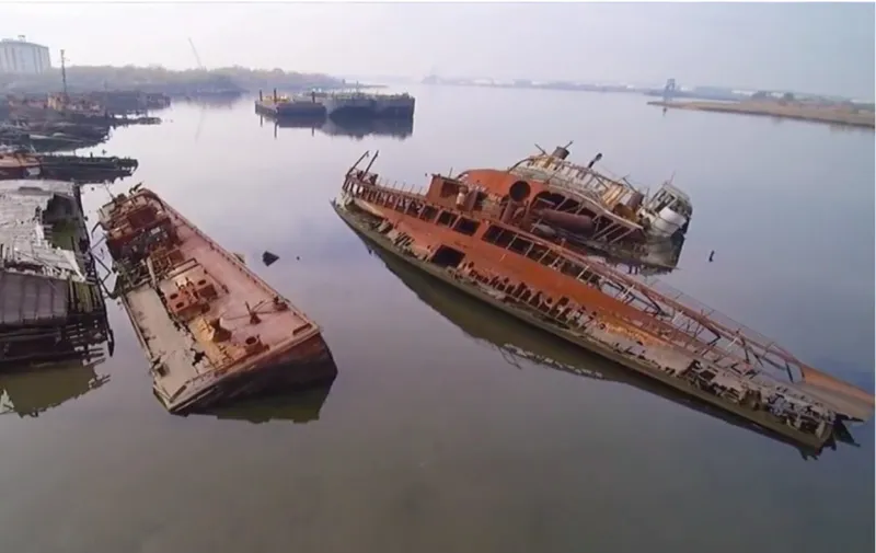 Abandoned ship structures inspire CityScraper’s recycled material strategy and industrial urban character.