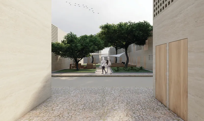 Shared courtyards create calm gathering spaces between homes and community life.