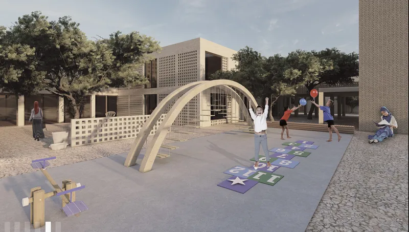 The school courtyard combines play, learning, and safe outdoor interaction for children.