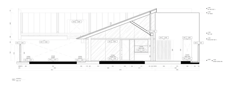 Section drawing showing the pitched roof structure with exposed timber trusses over interior dining spaces