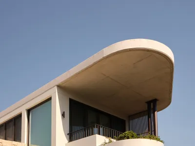 Stanton Architects Sculpts a Curving Family Home into Sydney's Inner West Fabric