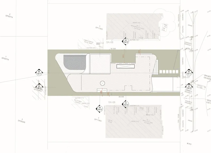 Site plan drawing showing a rectilinear building footprint with pool and courtyard areas on a narrow urban lot