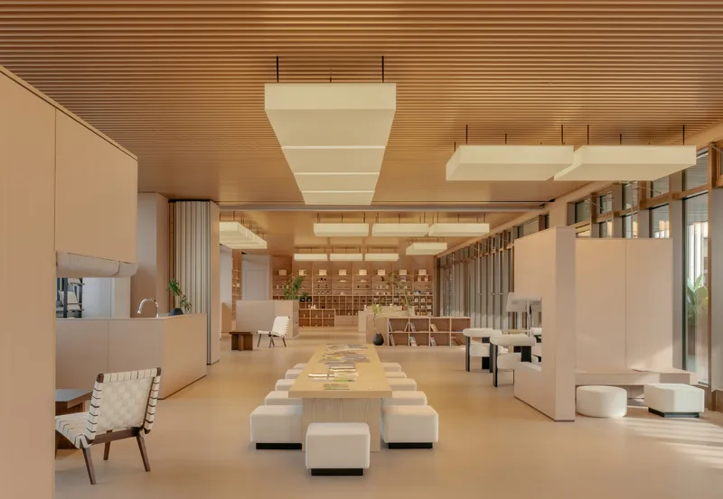 Open lounge with timber table, white seating cubes, and suspended cloud fixtures under a slatted ceiling
